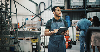 Buy stock photo Distillery, tablet and man in factory walking for alcohol production, manufacturing and checklist. Brewery, distribution business and person on tech for fermentation, quality control and inspection