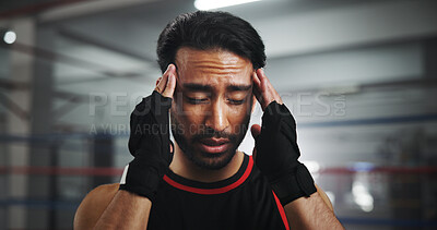 Buy stock photo Man, headache and pain at gym for boxer by ring for fight, fatigue and concussion at training center. Person, migraine and athlete with stress, mixed martial arts and vertigo at fitness club
