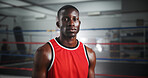 Workout, boxer and portrait of black man in gym for mma fighter, training and athlete practice. Wrestling challenge, martial arts club and sports with person and boxing ring for exercise and fitness