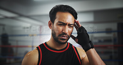 Buy stock photo Man, headache and tired at gym for boxing, fatigue and concussion at training center. Person, migraine and fighter athlete at ringside with stress, mixed martial arts and vertigo at fitness club