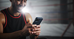 Hands, phone and texting at gym by boxing ring with notification for invite to global contest at training center. Person, athlete and fighter with smartphone, happy and chat at martial arts club