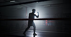 Person, silhouette and boxing in ring with punch, training and power with routine for combat sports. Athlete, fighter and mixed martial arts with workout, fitness and ready for competition at club