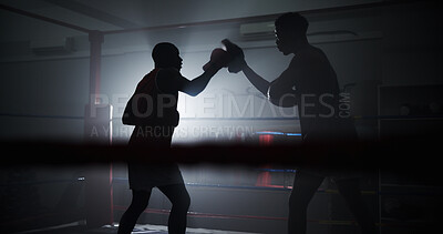 Buy stock photo Boxing, coaching and silhouette with men in ring for sparring practice, training or fitness team. Mma club, wrestling and martial arts fighter with people in gym for personal trainer and self defense