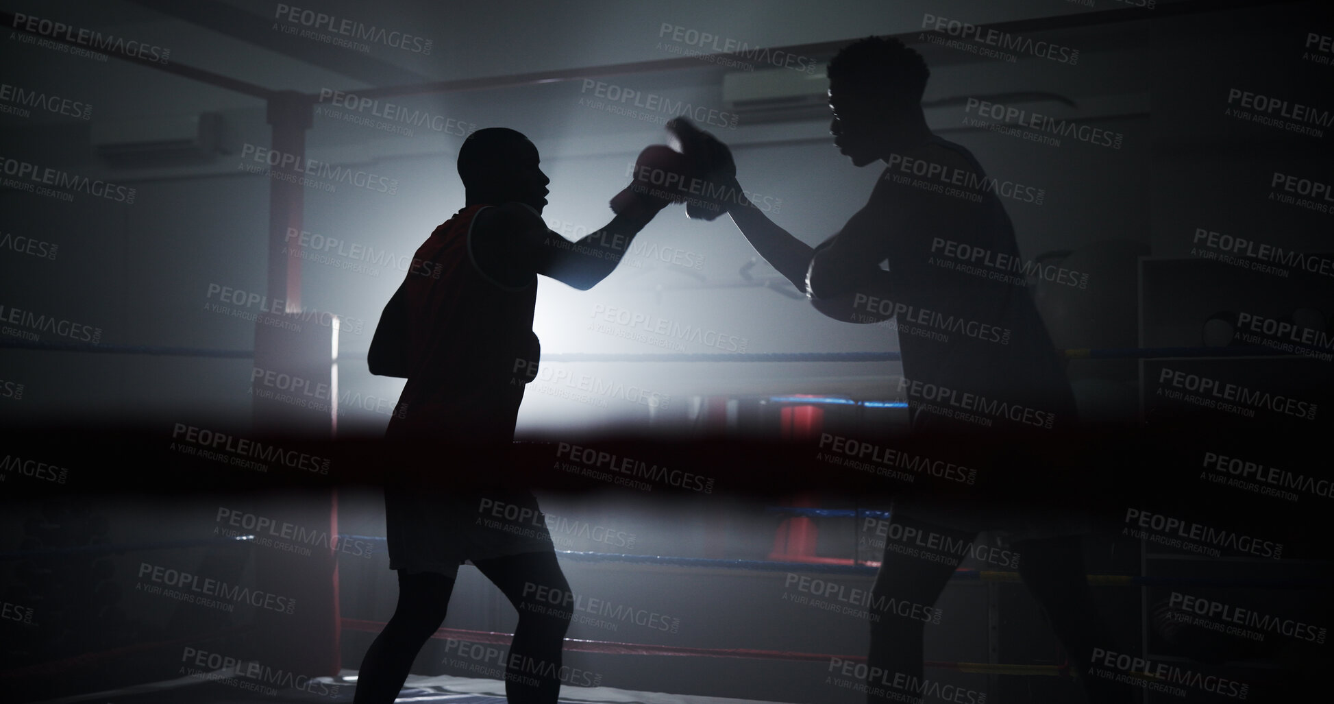 Buy stock photo Boxing, coaching and silhouette with men in ring for sparring practice, training or fitness team. Mma club, wrestling and martial arts fighter with people in gym for personal trainer and self defense
