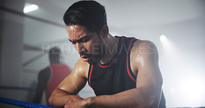 Buy stock photo Man, boxer and breathing in gym, tired with intense recovery and mindset for self defense exercise. Serious, fatigue and rest with exhausted male athlete, fitness and endurance workout in boxing ring