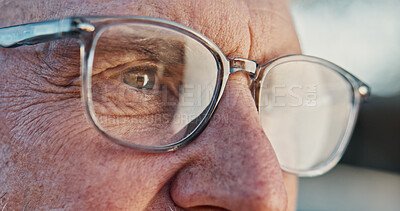 Buy stock photo Glasses, closeup and eyes with thinking for vision, optometry or wellness with prescription lens for eyesight. Senior, face and male person with optical solution, eyecare and ophthalmology frame
