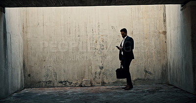 Buy stock photo Business, phone and space with man by concrete wall for communication or networking. Application, social media or text message and person with briefcase on mockup for data, information or update