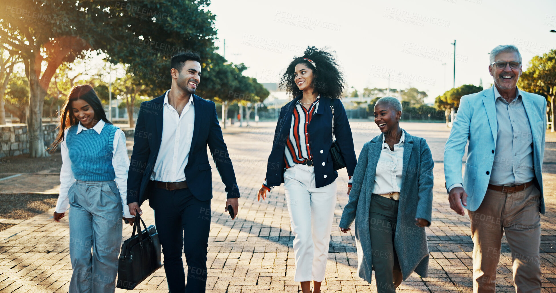 Buy stock photo Morning, commute and business people in park for travel to work with discussion and teamwork. Happy, laugh and bonding with coworkers walking in nature together for collaboration or project review