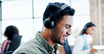 Business, contact us and smile of man in call center for assistance, communication or help. Customer service, feedback and headset with happy employee in agency workplace for virtual support