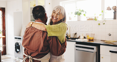 Buy stock photo Dancing, cooking and senior couple hug in house kitchen for bonding, marriage relationship and romance. Retirement, laughing and happy elderly people in home for supper, lunch and dinner together