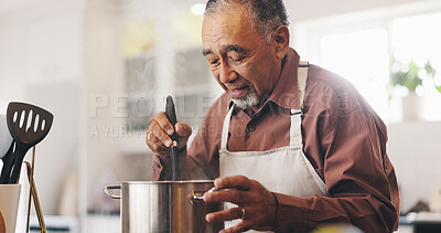 Buy stock photo Food, cooking and mature man in kitchen in home with dinner, meal or dish in pot with recipe. Chef, vitamins and male person preparing supper on stove with health, wellness and nutrition in house.