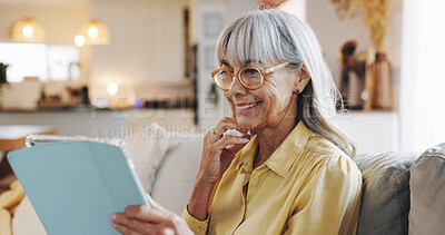 Buy stock photo Senior woman, tablet and smile with living room, sofa and reading online news blog post. Relax, digital technology and mature person with app, internet scroll and social media at home for retirement