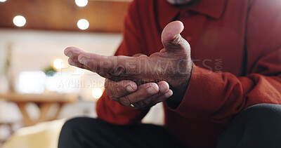 Buy stock photo Mature man, hand pain and arthritis on couch in home, carpal tunnel and joint problem with gout. Palm, senior person and bone inflammation with rheumatism, crisis and living room with strain injury
