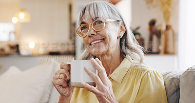 Buy stock photo Coffee, thinking and smile with senior woman on sofa in retirement home for memories or nostalgia. Happy, relax and wellness with mature person drinking caffeine beverage in apartment for weekend