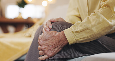 Buy stock photo Hands, inflammation and knee pain with mature person on sofa in living room of home for arthritis. Accident, emergency or joint injury and senior in apartment with osteoarthritis or tendinitis