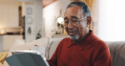 Buy stock photo Coffee, tablet and happy senior man with living room, sofa and reading online news blog post. Relax, digital technology and mature person scroll with internet, smile and social media meme at home