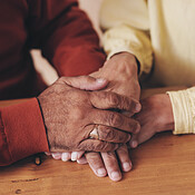Home, table and old couple with holding hands for empathy, support and ...