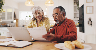 Buy stock photo Elderly couple, documents and finance in home for results, laptop or smile with goal for pension. Interracial relationship, man and woman for investing, happy or profit for retirement income in house