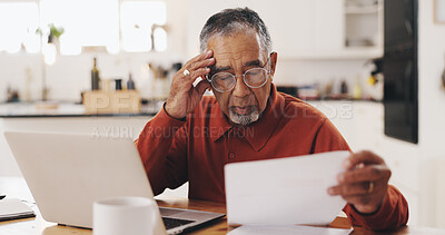 Buy stock photo Senior man, paperwork and taxes with stress in home, documents and financial review for pension. Elderly person, laptop and headache with budget, bills or confused with retirement income in kitchen