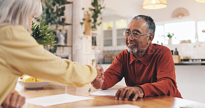Buy stock photo Home, documents and old man with financial advisor for handshake, greeting and deal for insurance. House, senior person and retirement planner with shaking hands for pension finance, saving and paper