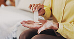 Person, hands and pills for arthritis, pain and illness or chronic disease treatment. Elderly woman, living room and pharma with drugs for retirement, wellness and healthcare schedule for recovery