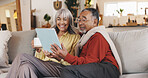 Home, tablet and old couple on sofa, smile and conversation with retirement, app and love. Social media, apartment and senior man with elderly woman, tech and entertainment with message or connection