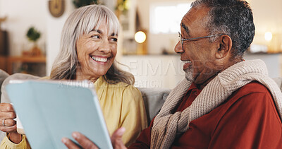 Buy stock photo Home, tablet and senior couple with smile, love and conversation with retirement, app and social media. Internet, marriage and old man with elderly woman, tech and bonding together with entertainment