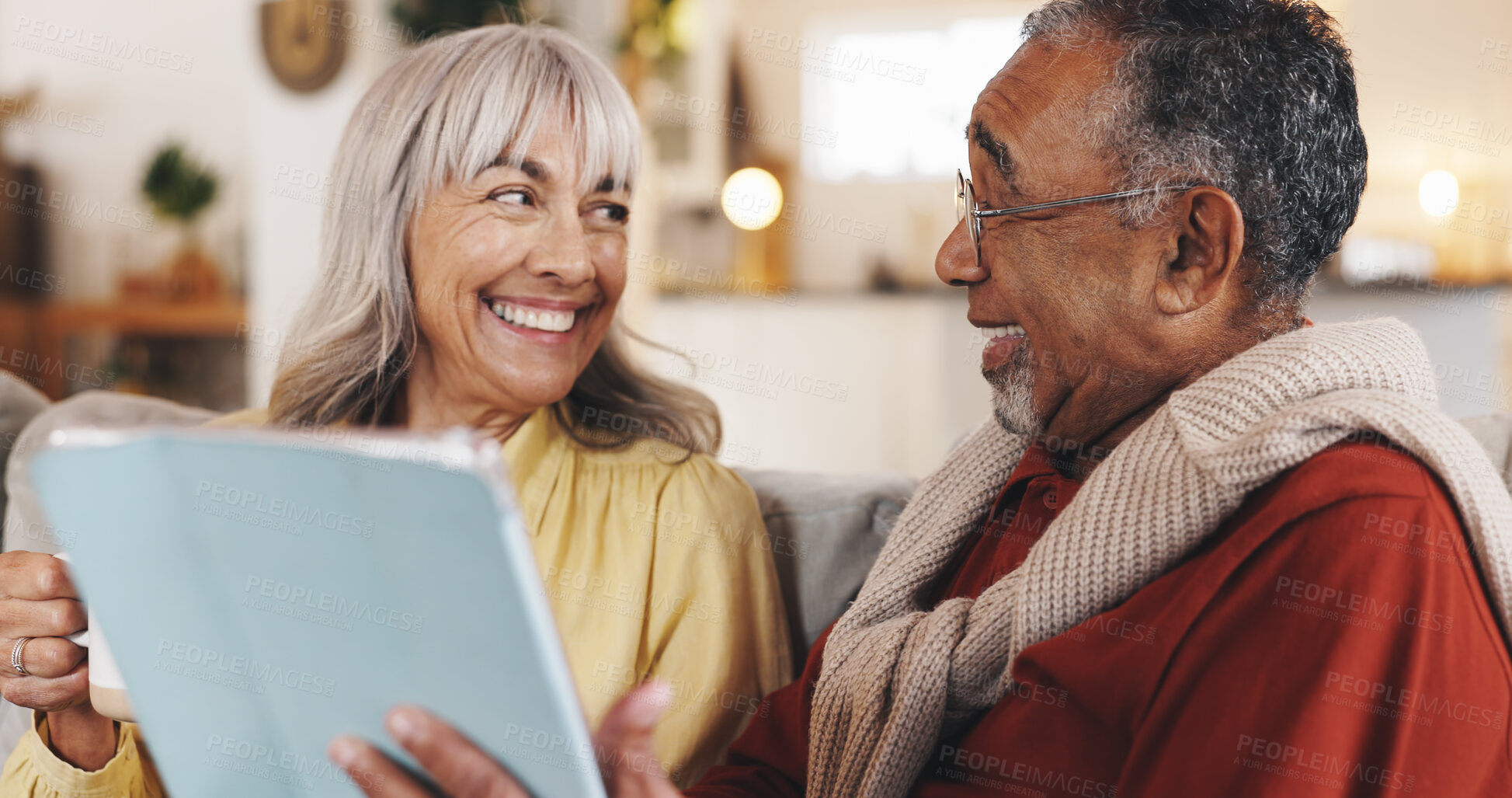 Buy stock photo Home, tablet and senior couple with smile, love and conversation with retirement, app and social media. Internet, marriage and old man with elderly woman, tech and bonding together with entertainment