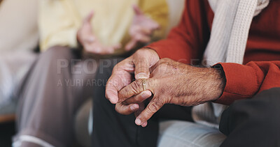 Buy stock photo Elderly couple, ring or hands in home for conflict, regret or doubt in marriage with partner. Senior man, wedding band or fidget with anxiety for divorce, argument or strain in relationship with wife