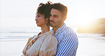 Hug, love and couple on beach for travel, romance and support on vacation for summer sea sunset. Ocean, people and adventure with connection for commitment, care and holiday together on island