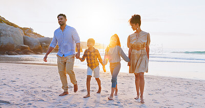 Buy stock photo Parents, walk and holding hands with kids on beach for summer holiday, travel and bonding together. Family, children and journey on ocean for getaway, tropical vacation and adventure of weekend trip