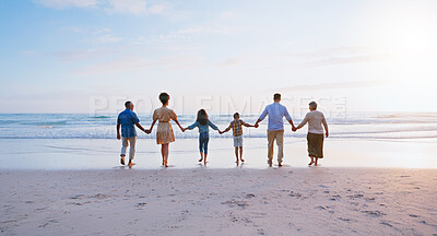 Buy stock photo Big family, walk and holding hands with children on beach for summer holiday, travel and bonding. Space, back and parents with kids for ocean journey, tropical vacation and getaway adventure for trip