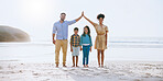 Portrait, outdoor and family with smile, beach and protection of children with cover, roof and hands. Bonding, happy and parents with safety for kids, man and woman on summer holiday, sea or together