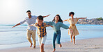 Parents, children and plane with running at beach, smile and playful with bonding on vacation in summer. Family, man and woman with kids, airplane and speed for game, flight and love by sea in Mexico