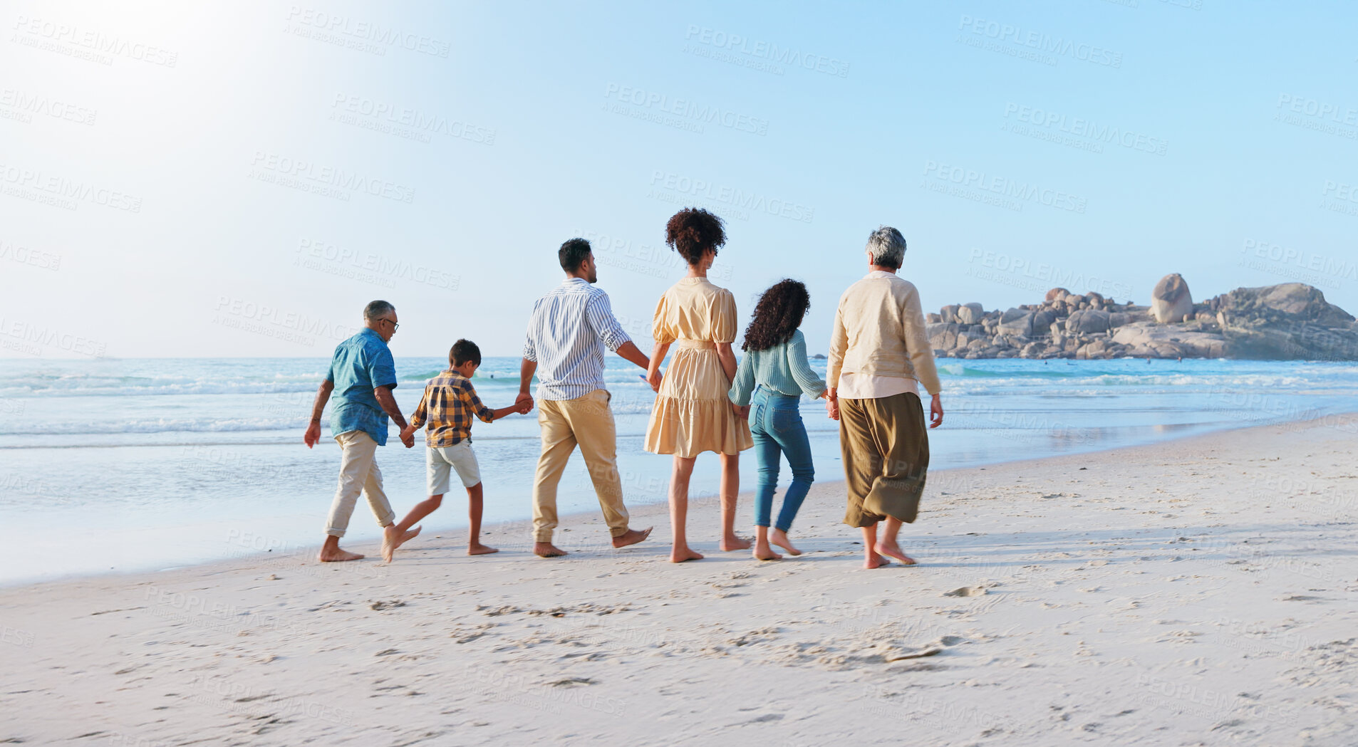 Buy stock photo Back, family and holding hands with kids on beach for summer holiday, travel and bonding together. People, children and space for journey on ocean, tropical vacation and adventure for getaway trip