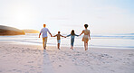 Back, parents and holding hands with children on beach for summer holiday, travel and bonding together. Space, family and journey on ocean for getaway, tropical vacation and adventure of weekend trip