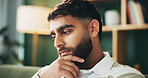 Serious, thinking and man in home with decision, planning or remember memory. Vision, reflection and person in living room with thoughts for solution, problem solving and brainstorming with ideas