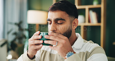 Buy stock photo Home, sofa and man with tea to drink, warm beverage and espresso in living room on weekend. House, male person and relax with aroma smell of matcha, coffee cup and comfortable on couch in lounge