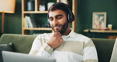 Buy stock photo Man, laptop or thinking with headphones on sofa for streaming music, watching online movie or social media. Happy, person and tech in home for film audio, listening to podcast and video entertainment