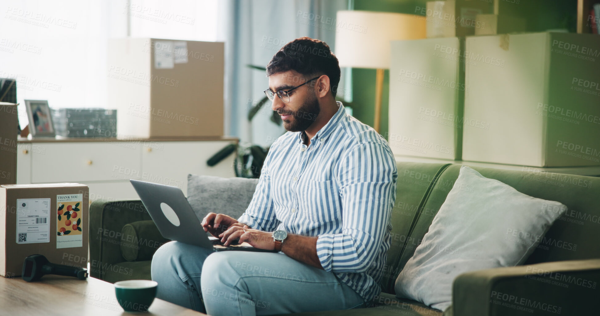 Buy stock photo Home, man and typing on laptop for logistics, distribution and remote work for customer service. Sofa, male person and business owner with digital for ecommerce, inventory management and supply chain