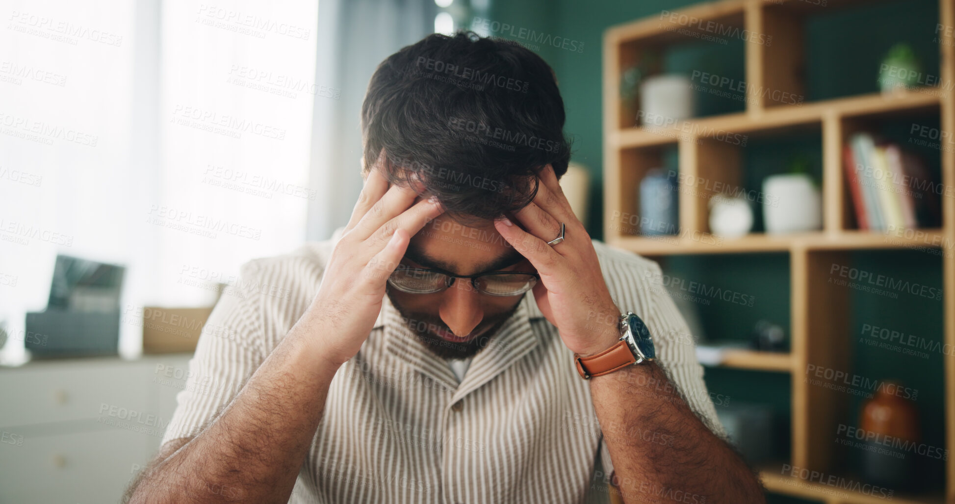 Buy stock photo Remote work, man and headache in home with stress, mistake and project crisis in startup. Entrepreneur, mental health and doubt in living room with burnout, brain fog and upset for business debt