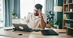 Remote work from home, headache and man with computer, fatigue or overwhelmed with deadline. Person, freelancer or documents with laptop, burnout or exhausted with migraine, low energy or sleepy mood