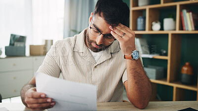 Buy stock photo Remote work, man and headache in home with paperwork, mistake and finance crisis in startup. Entrepreneur, mental health and doubt in living room with invoice, document and upset for business debt