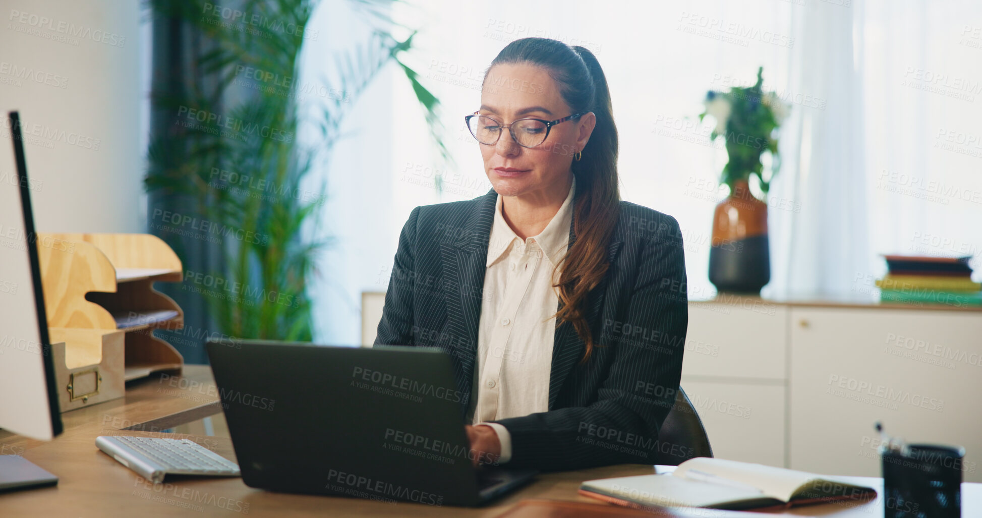 Buy stock photo Business, woman and typing on laptop in office for legal research, case preparation and drafting lawsuit report. Attorney, employee and technology at desk for online court review, planning and email