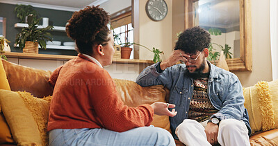 Buy stock photo Home, divorce and couple with stress, fighting and mistake with toxic relationship, crisis and cheating. Apartment, argument or man with woman on sofa, conflict and frustrated with marriage or angry
