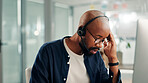 Frustrated, black man and consultant with headset for stress, difficult customer or bad news at office. Male person, agent or listening with technology or mic for online communication at call center