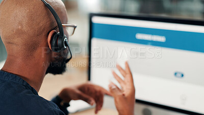 Buy stock photo Black man, screen or consultant with computer at call center for online advice, help or customer service. Back, chat or sales agent with headset for virtual assistance, contact support or feedback