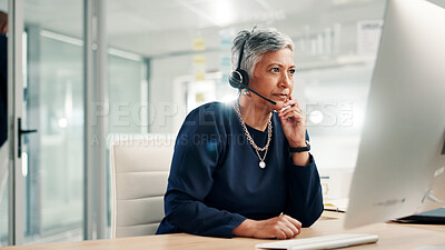 Buy stock photo Office, call center and mature woman on computer for contact us, crm service and customer support. Business, professional consultant and person with headset for communication, advice and feedback