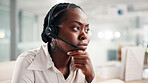 Black woman, consultant and worry with headset at call center for error or difficult customer. Female person, agent or employee with mic for virtual assistance, help or communication at office desk