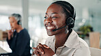 Happy, black woman and agent with headset at call center for virtual assistance or customer service. Female person, consultant or smile with technology, mic or help for online communication at office